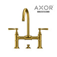 AXOR Montreux 16511250 Двухвентильный смеситель для раковины с поворотным изливом (шлифованное золот